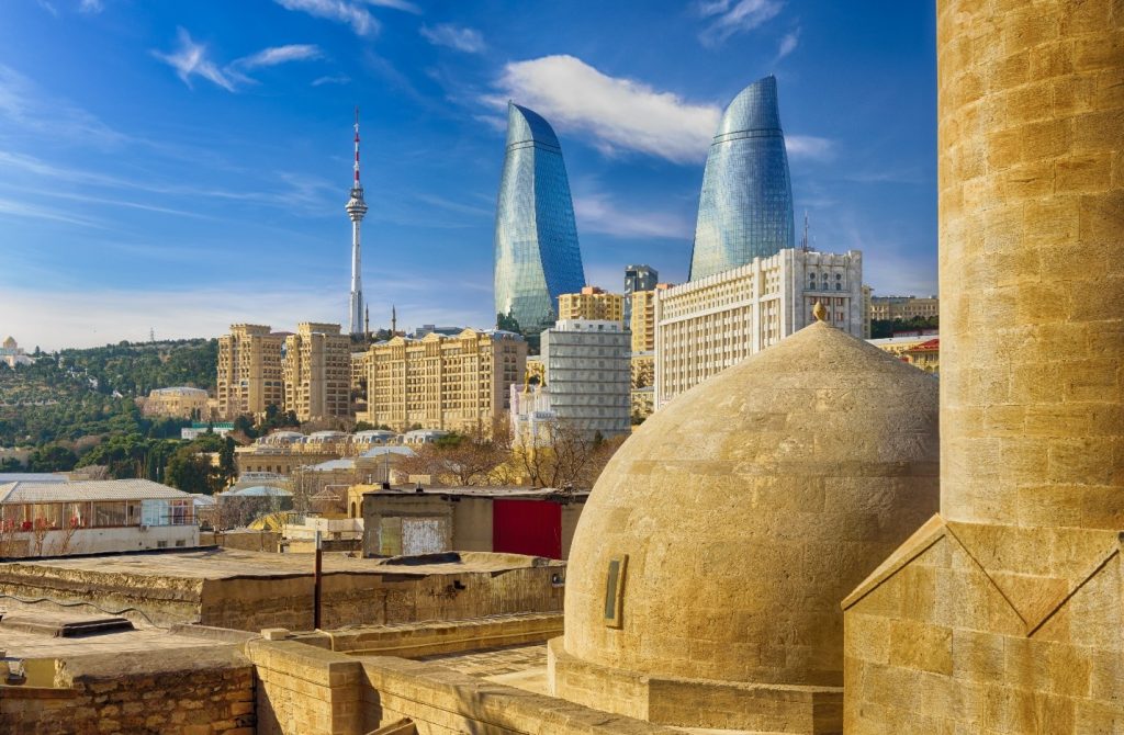 Your Caucasus adventure begins in Baku, a city of startling contrasts. Step off the plane and you're in the 21st century: the iconic Flame Towers curve skyward like three tongues of fire above the Caspian waterfront, their LED facades visible for miles.