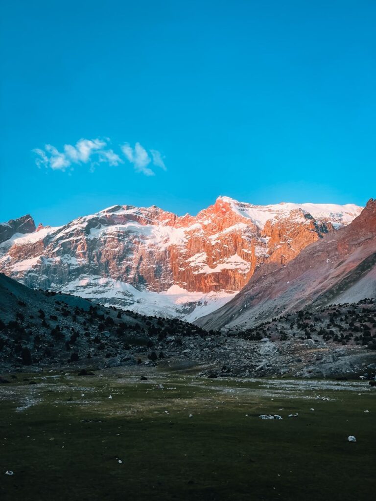 blue sky over a mountain valley at dusk