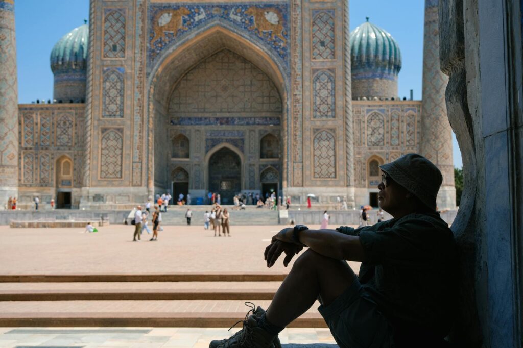 traveler relaxing at historic samarkand landmark