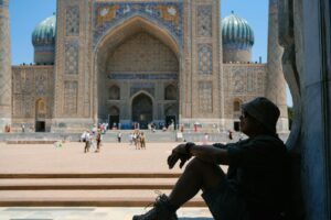 traveler relaxing at historic samarkand landmark