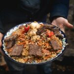 close up of holding delicious food on a plate