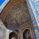 Historic ornate blue tilework and grand Islamic architecture in Uzbekistan