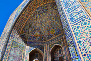 Historic ornate blue tilework and grand Islamic architecture in Uzbekistan