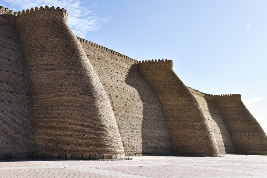 Architectural detail of the historic Ark Fortress walls in Bukhara, Uzbekistan