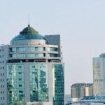 Astana skyline featuring modern architecture and iconic tower under a clear blue sky