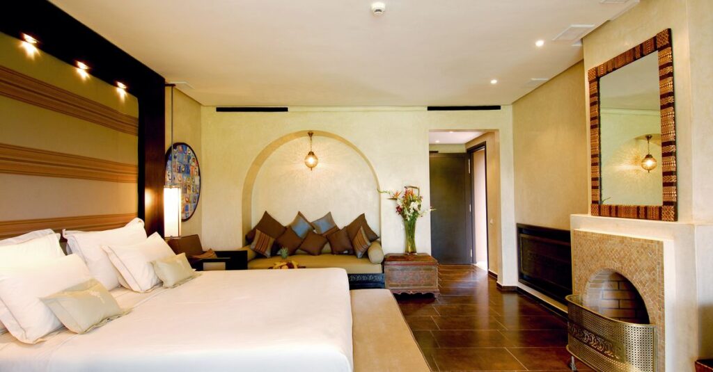 Elegant hotel room with a spacious bed and warm lighting