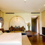 Elegant hotel room with a spacious bed and warm lighting