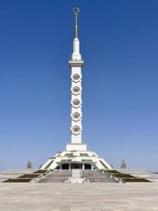 Neutrality Monument in Ashgabat, Turkmenistan under a blue sky