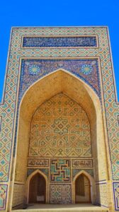 Entrance of the Kalan Mosque in Bukhara, Uzbekistan with intricate tilework